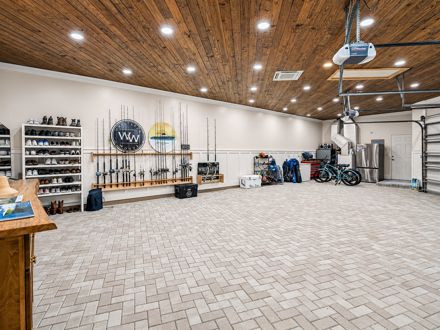 Custom garage interior with paver flooring and wood ceiling