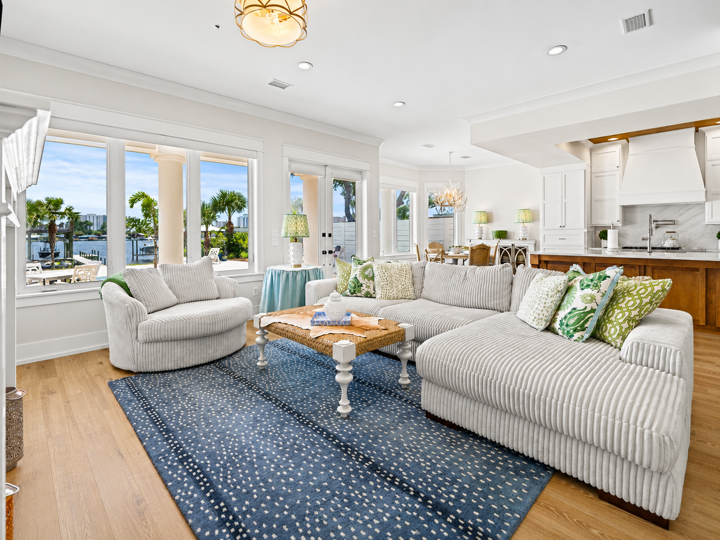 Coastal living room interior with waterfront views