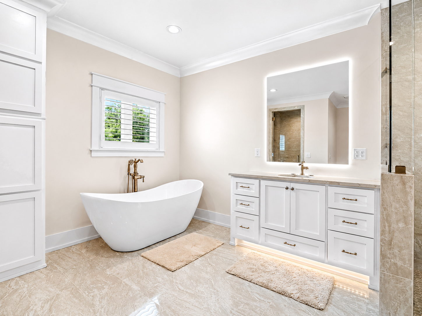 Luxury master bathroom with freestanding soaking tub