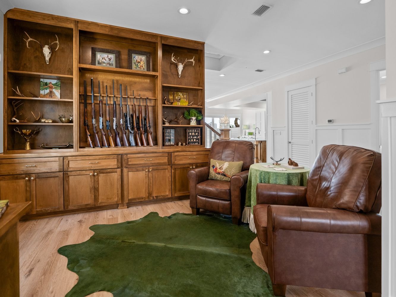 Custom built-in cabinetry and trophy room